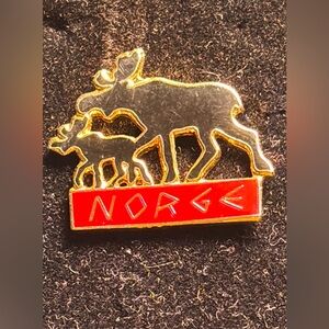 Norwegian souvenir Gold tone Moose hat Pin with Red Accent